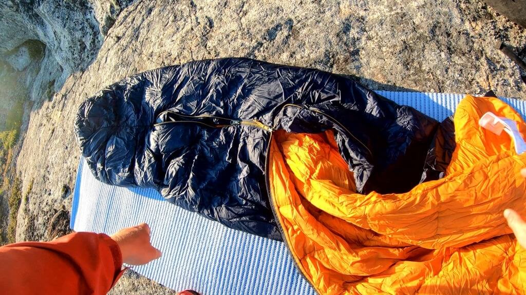 a massive sleeping for camping bag on the ground