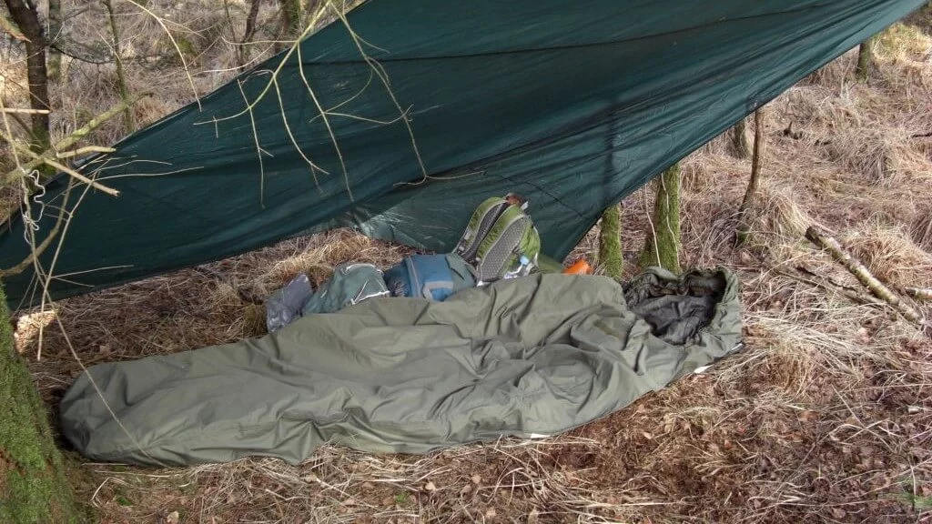 sleeping bag in the jungle under a tarp shed