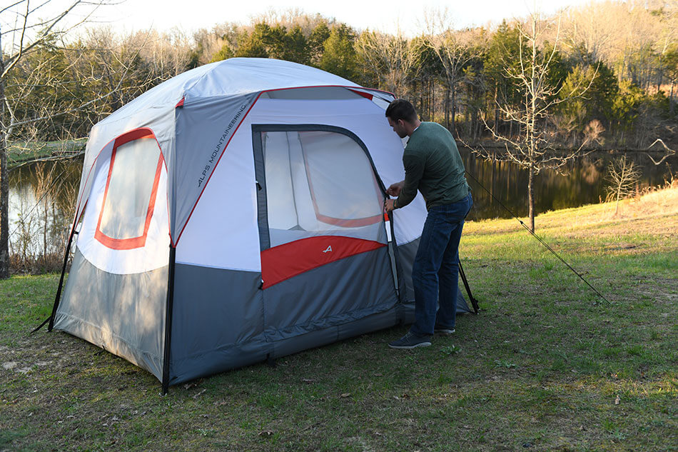 opening the door of ALPS Camp Creek Tent