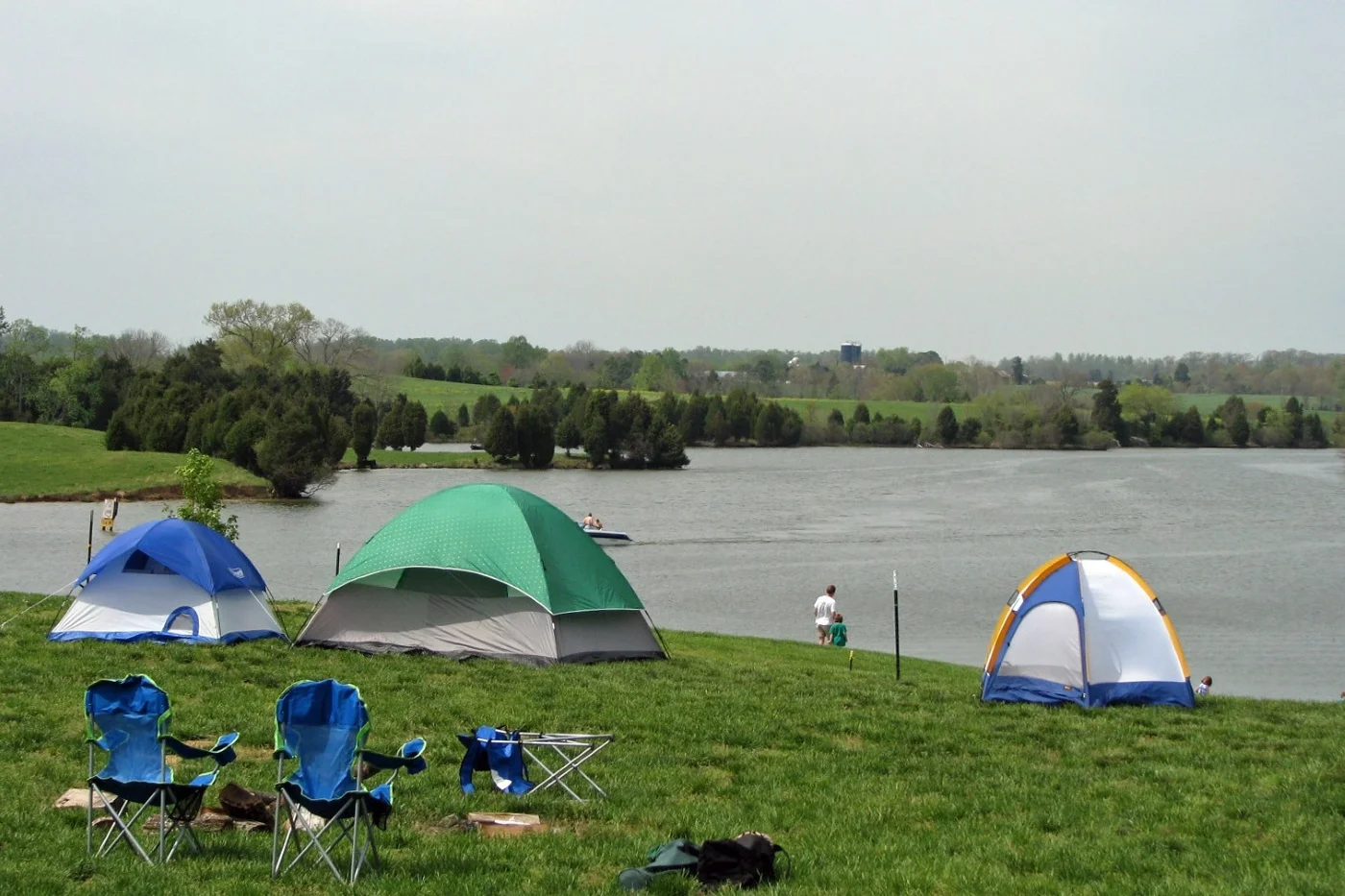 blue, green and white tents at Virginia campsite