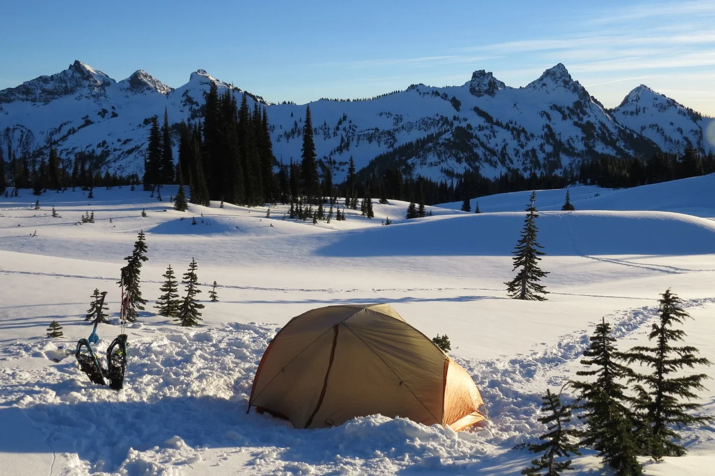 bright yellow tent set up in snow for high visibility