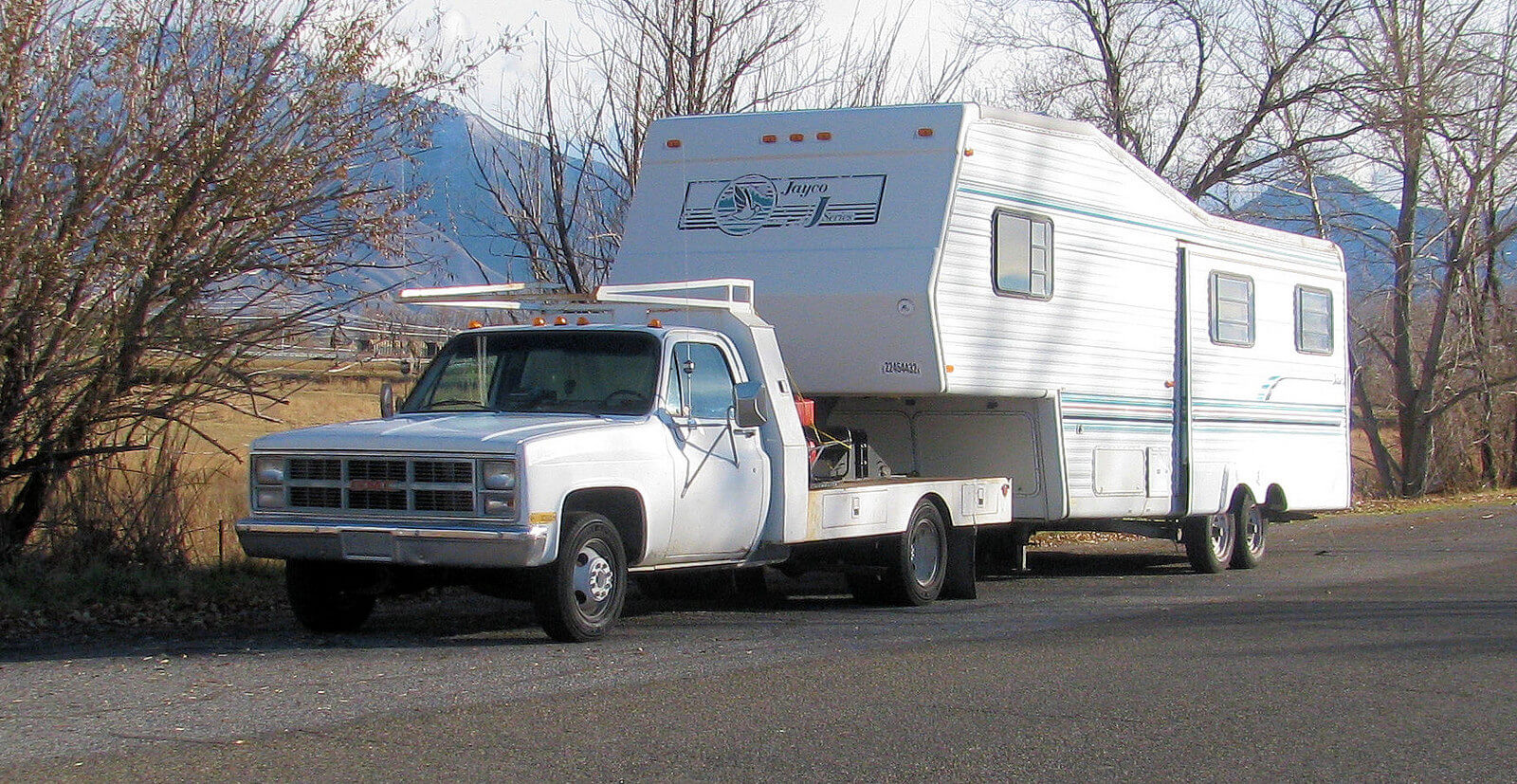 fifth wheel trailer with a towing truck