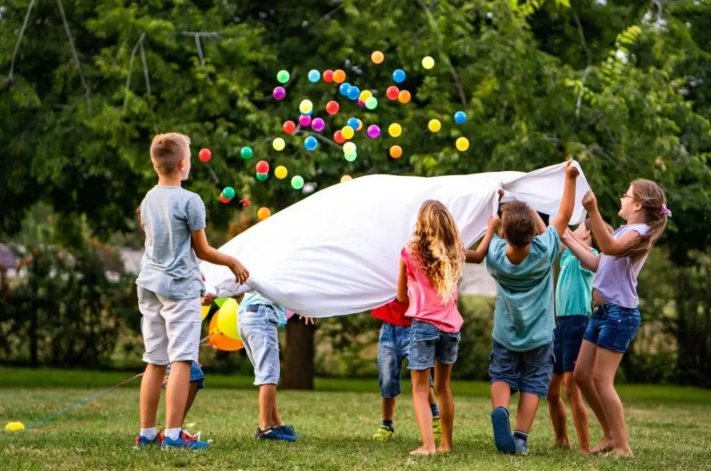 kids playing with balls outdoors