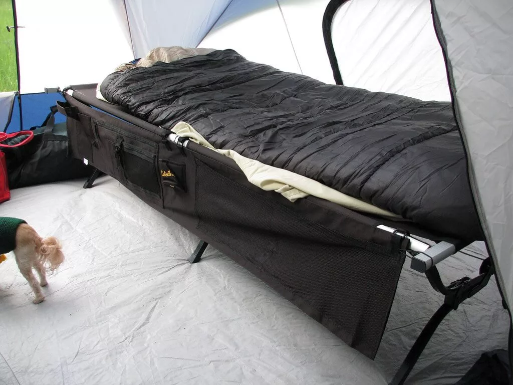 large camping cot in a tent