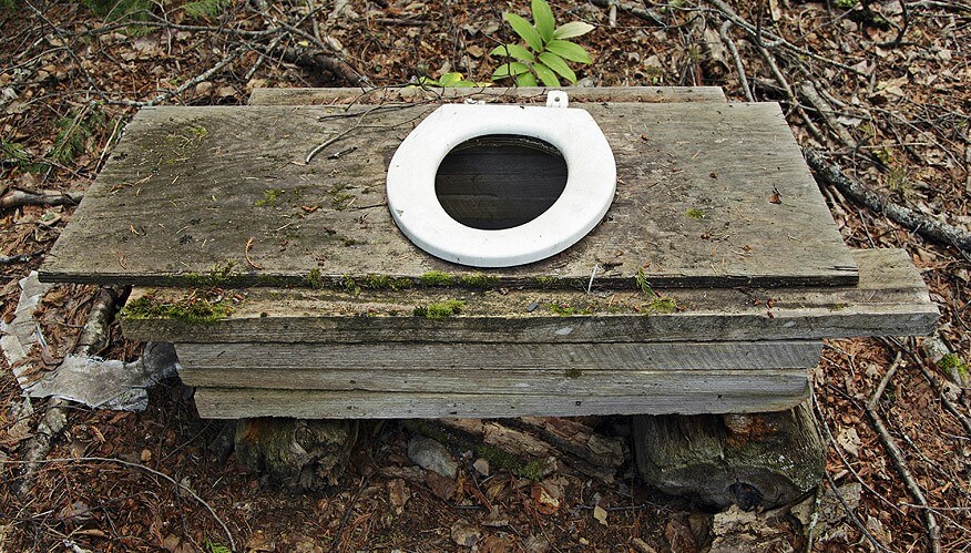 a composting toilet for pooping in the woods