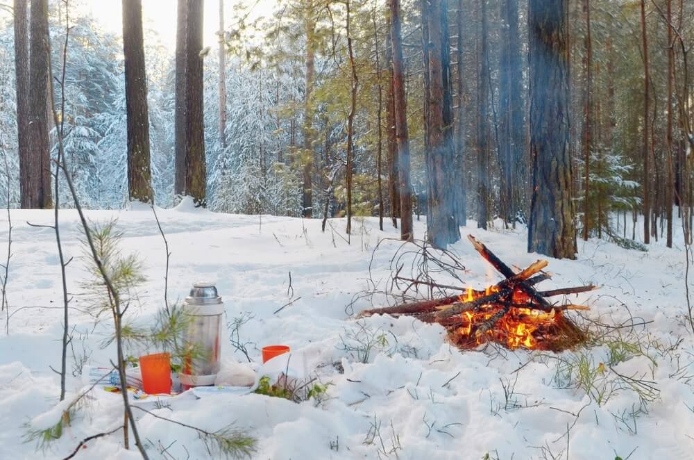 building a campfire in snow