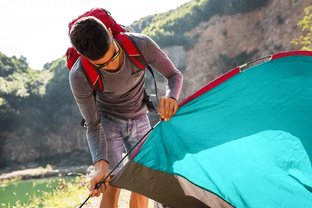 setting up a lightweight tent