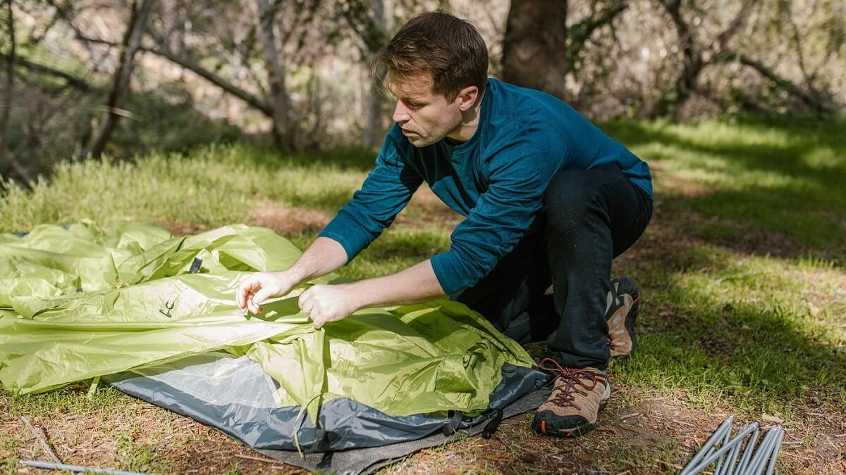 setting up a one-man tent
