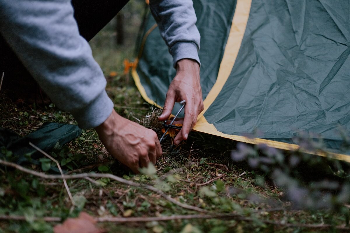 staking in a tent