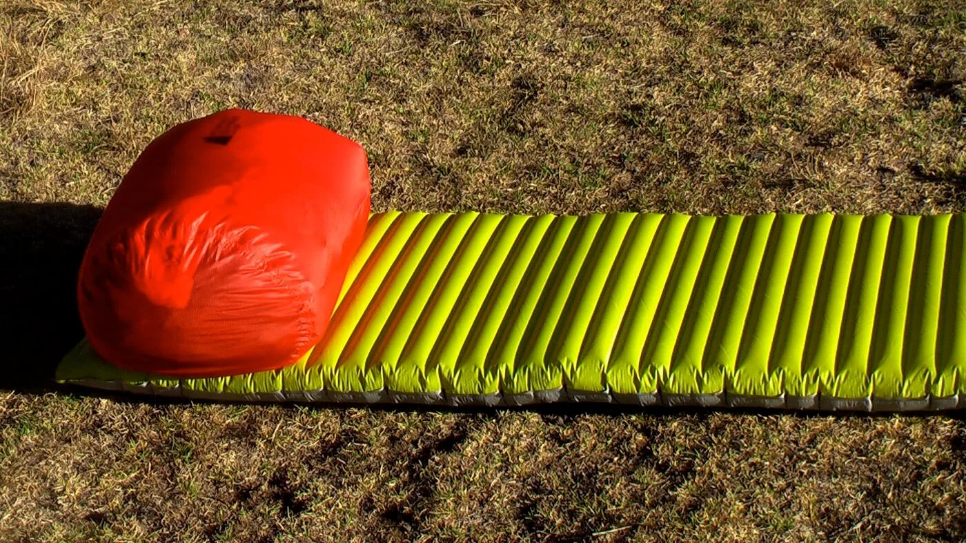 stuff sack camping pillow on a sleeping pad