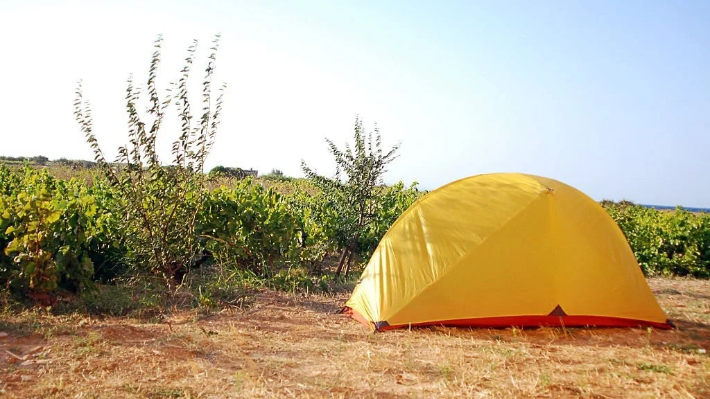 tent set up in hot summer