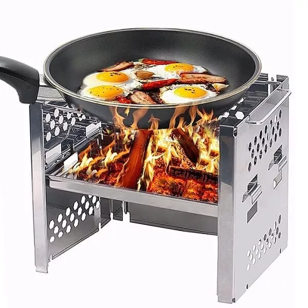 image of a unigear wood burning stove for backpacking with frying pan on top