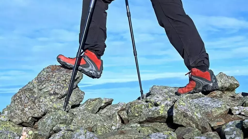 adjusting trekking poles for uneven terrains
