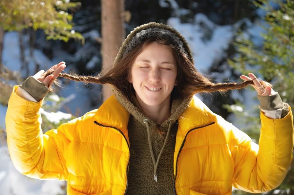 woman dressed in layers to deal with cold weather