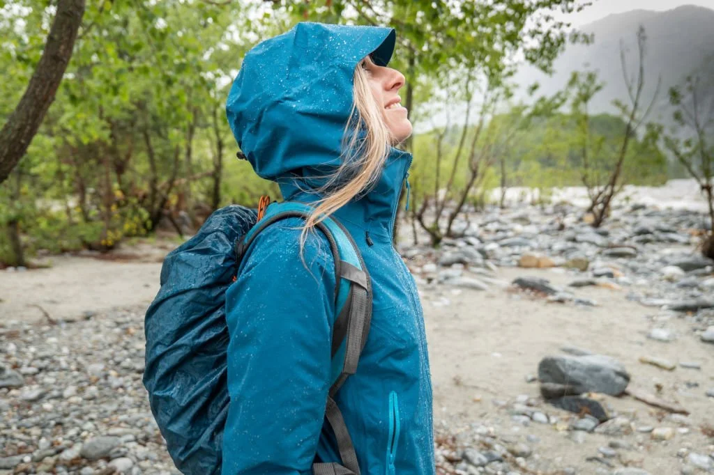 a lady wearing a rain jacket in the rain