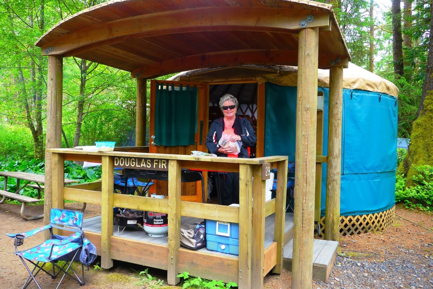 A female tourist camping at a yurt at Beverly Beach State Park